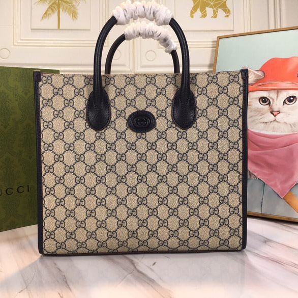 G*u*i shopping bags